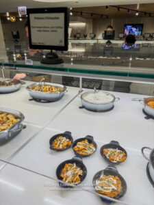 a buffet with food in bowls