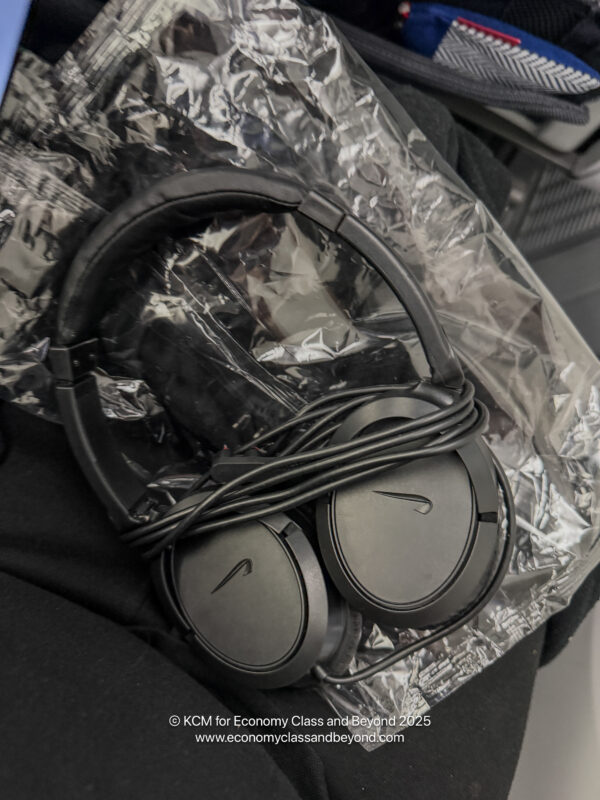 a pair of headphones on a plastic bag