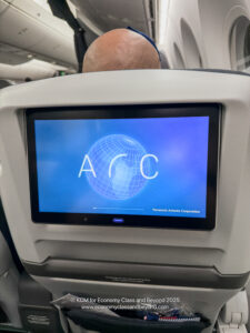 a screen on the back of a plane
