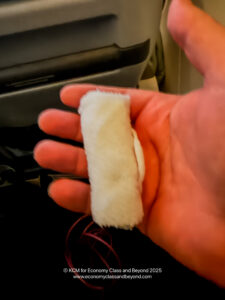 a person holding a gauze