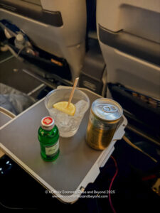 a drink and a glass on a tray