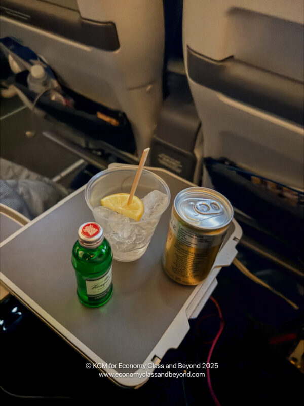 a drink and a glass on a tray