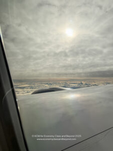 a view of the clouds from an airplane window