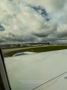 a view of a runway from an airplane window