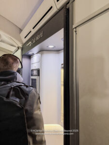 a man standing in front of a machine