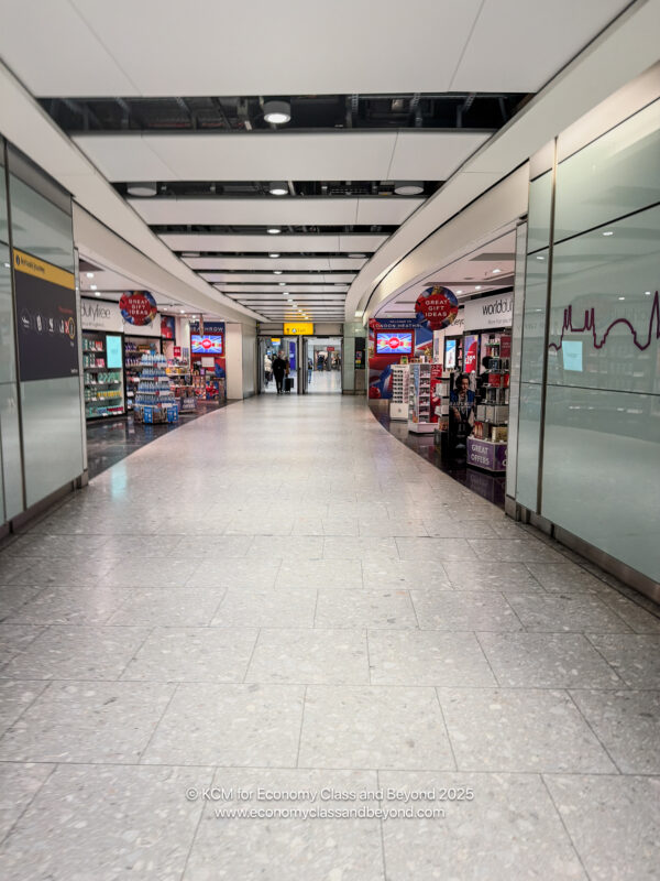 a hallway with a store in the middle