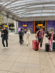 a group of people with luggage