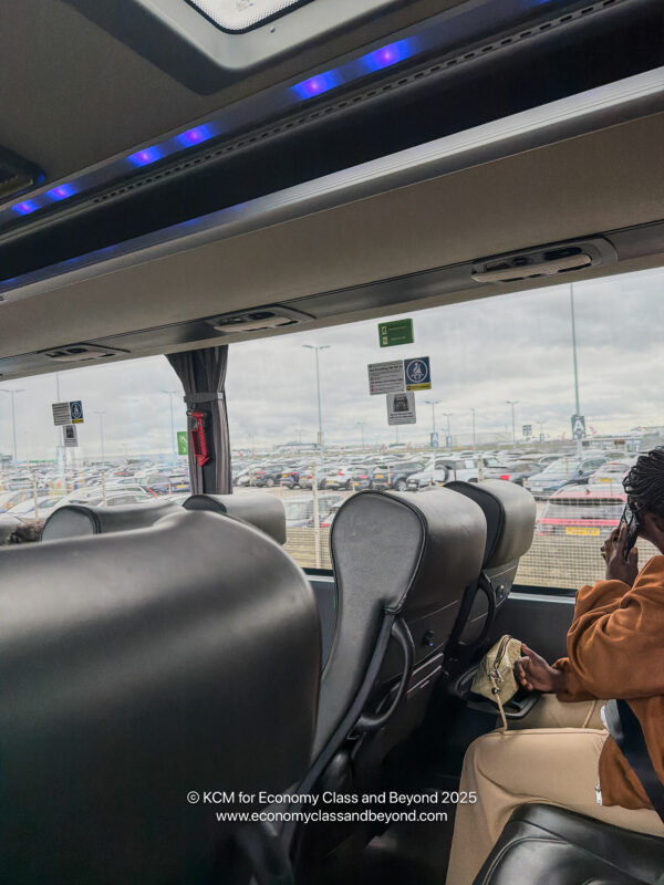 a person on a phone in a bus