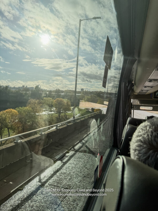 a view of a city from a bus window