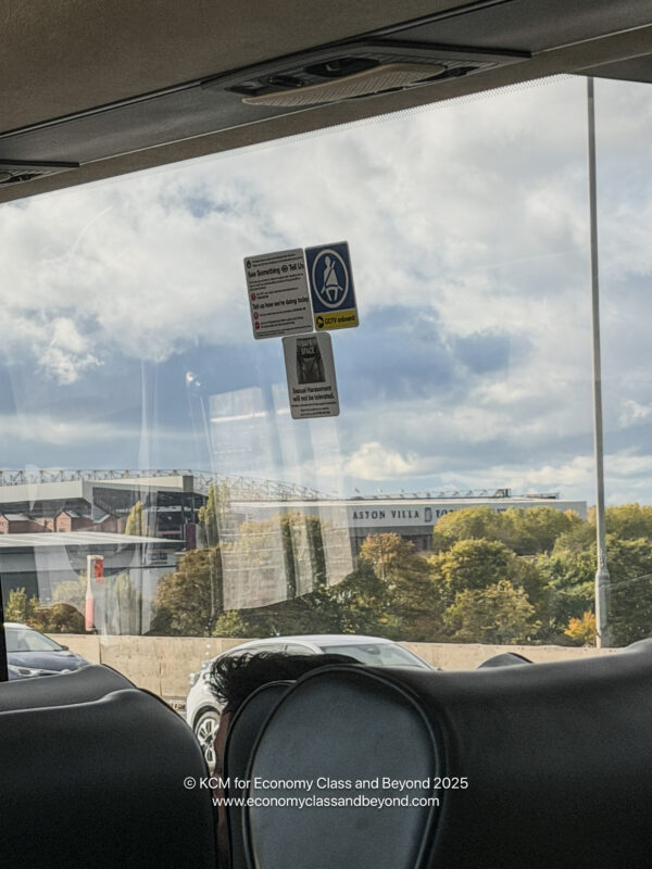 a view of a city from a bus window
