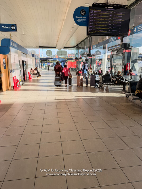 people walking in a terminal