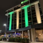 a building with green lights