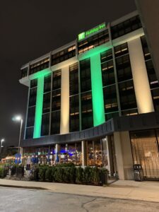 a building with green lights
