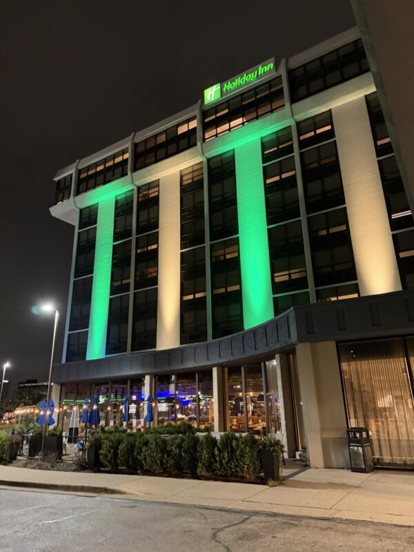 a building with green lights