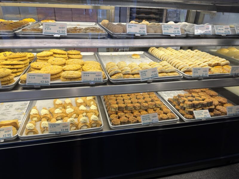 a display case of cookies and pastries