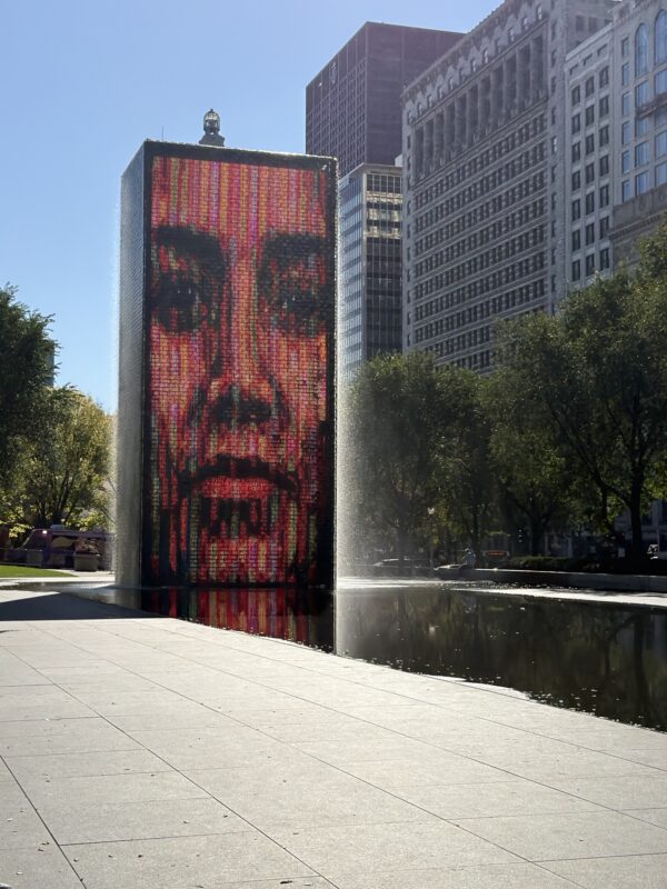 a large fountain with a face on it
