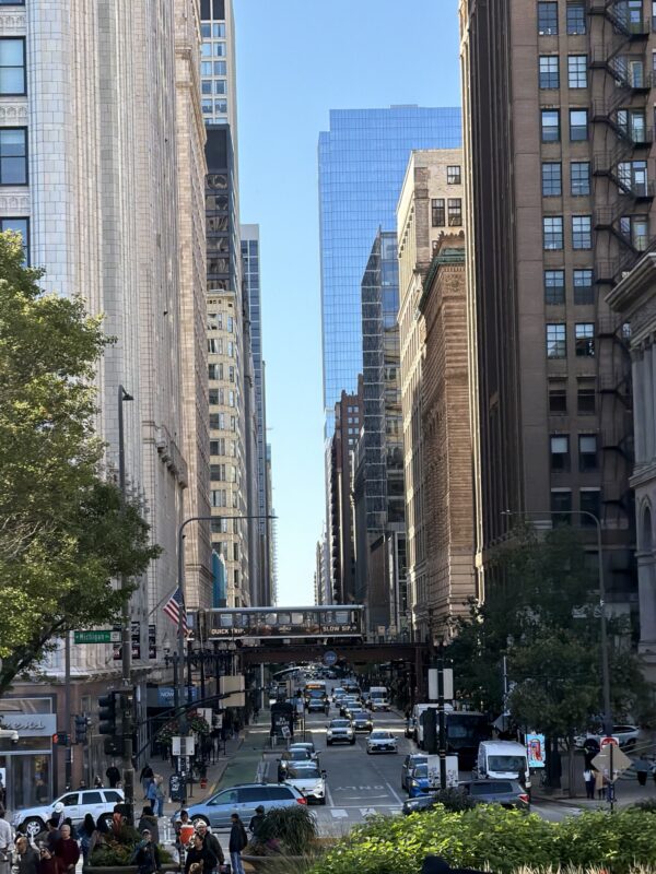 a street with cars and buildings
