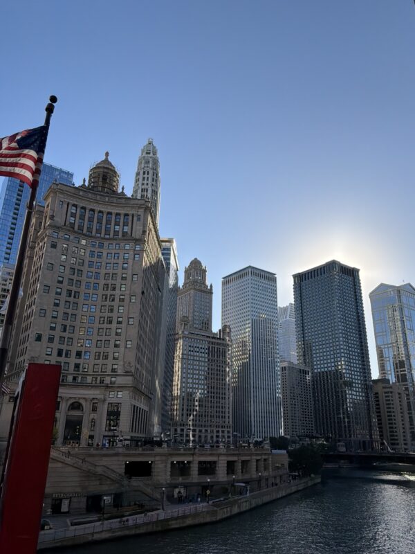 a city with a flag on the pole