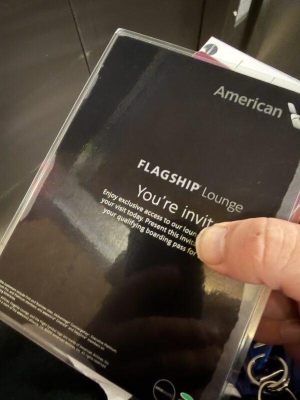 a hand holding a plastic case