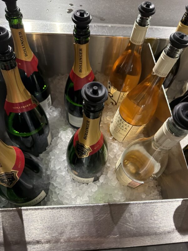 a group of bottles in a bucket of ice