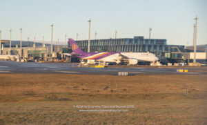 a two airplanes at an airport