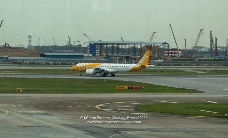 Scoot Embraer E190-E2 departing Singapore Changi - Image, Economy Class and Beyond