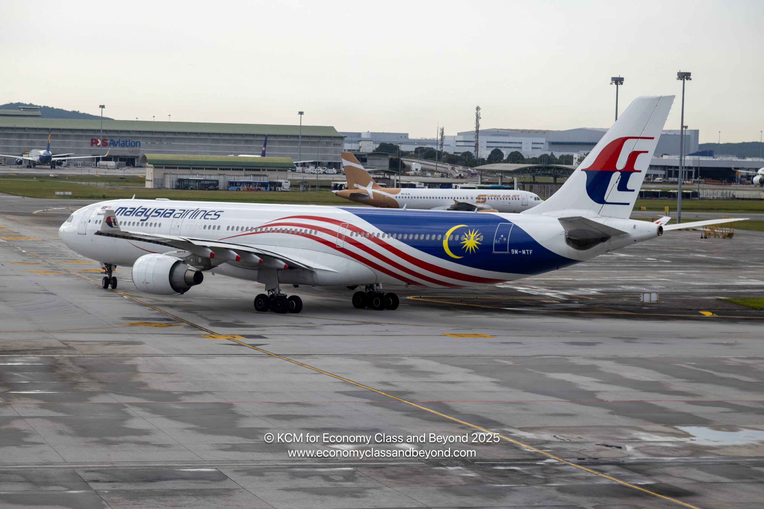 boardingarea.com - Kevincm - Airplane Art - Malaysia Airlines Airbus A330-300 taxiing out of Kuala Lumpur International Airport - Economy Class & Beyond