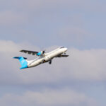 a plane flying in the sky