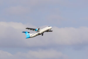 a plane flying in the sky