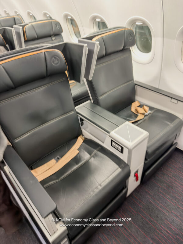 a black leather seats on an airplane