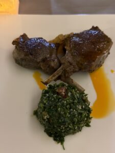 a plate of food on a white surface