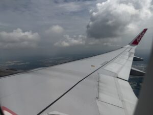 an airplane wing in the sky