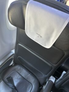 a seat with a white object on it