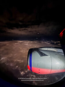 a view of a plane engine from the window of an airplane