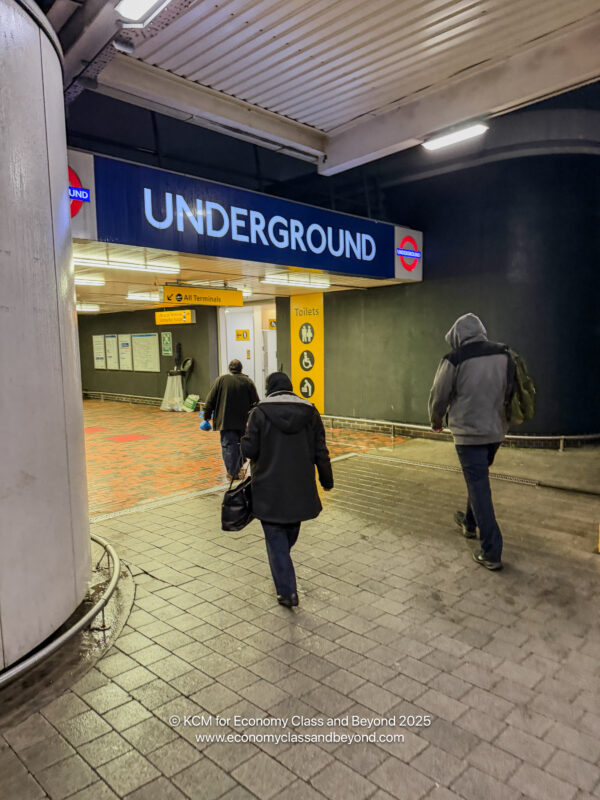people walking in a subway station
