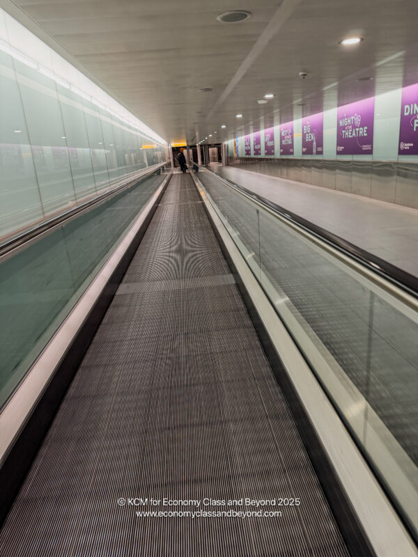 a moving walkway in a building