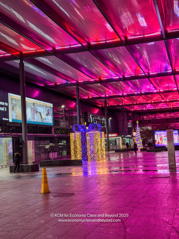 a large building with lights and signs