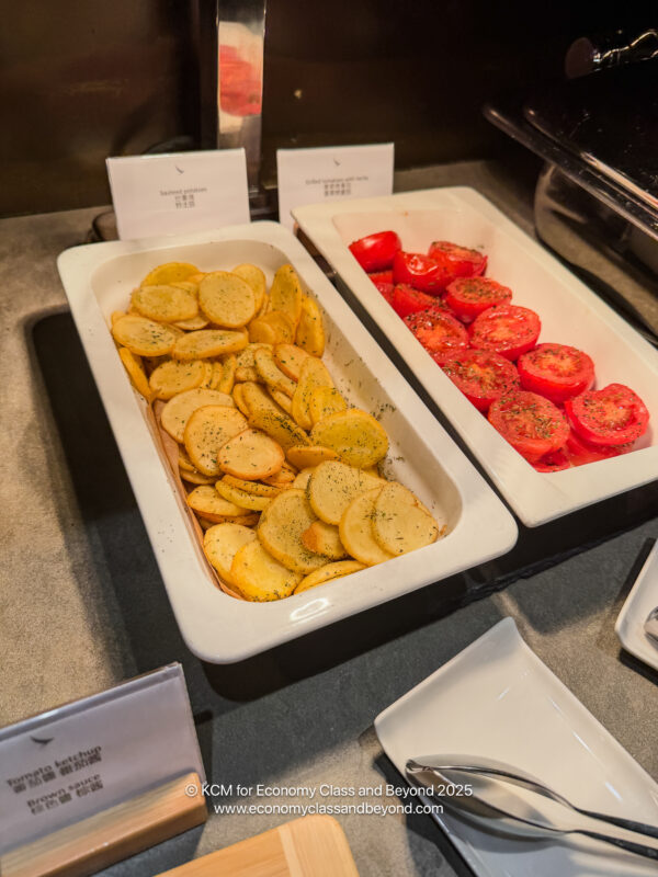 a trays of food with a price tag