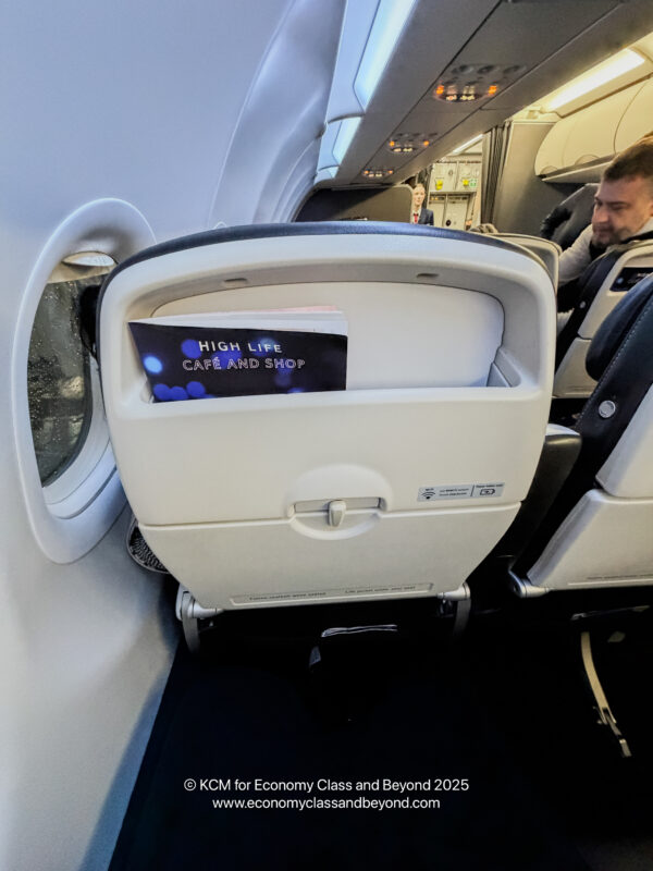 a man sitting in an airplane