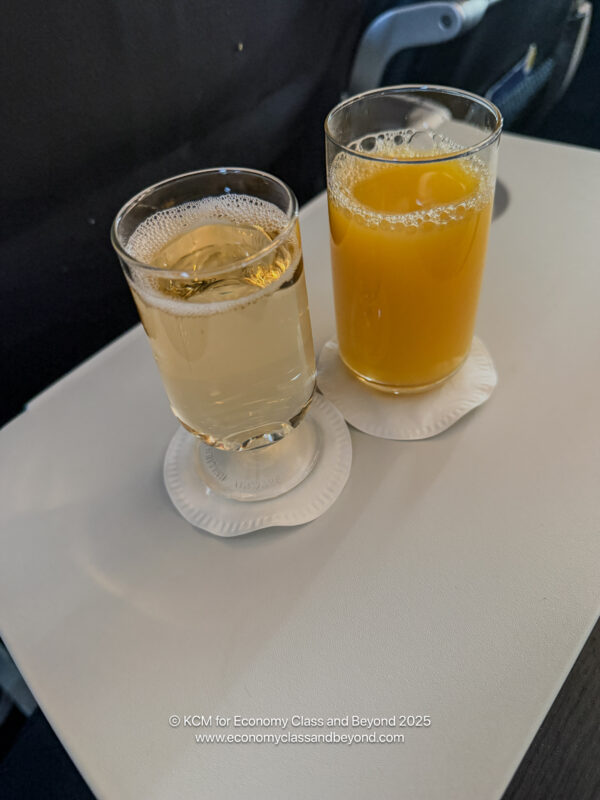 two glasses of liquid on a table