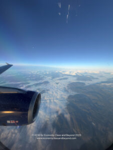 an airplane wing and the sky