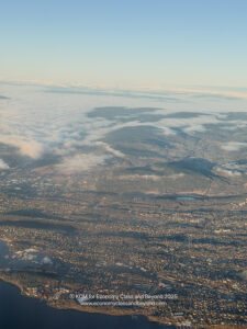 aerial view of a city and clouds