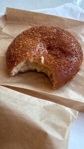a bagel with a bite taken out of it