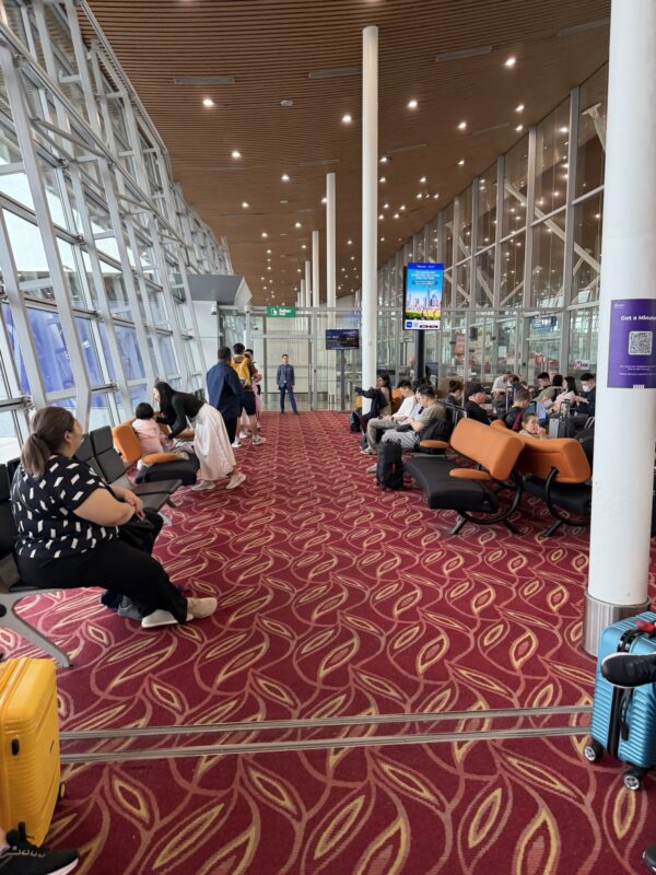 people sitting in a terminal