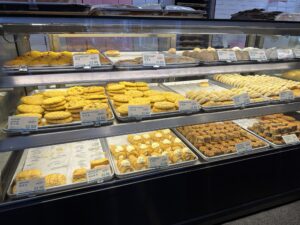 a display case with different types of cookies