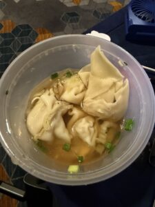 a bowl of wonton soup