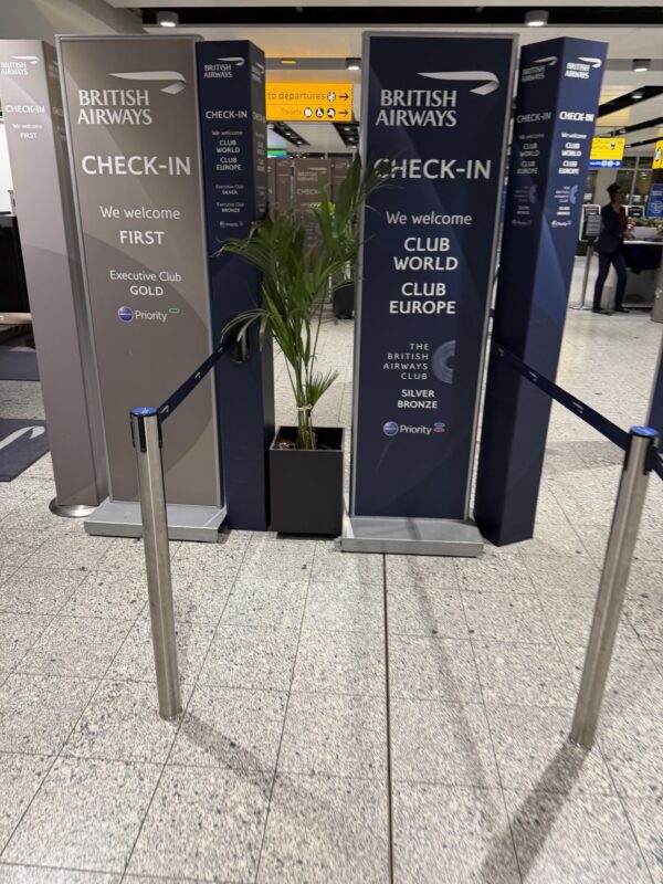 a group of signs in a airport