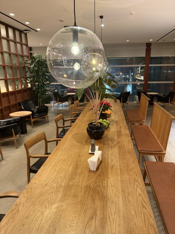a table with a large clear balloon on it