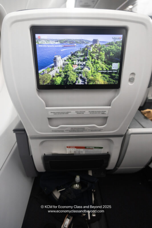 a tv on the back of an airplane