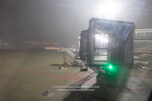 a large airport with a green light